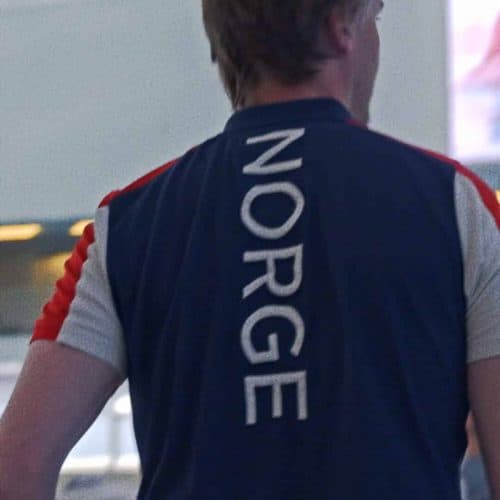 Showing the jersey on an athlete from the norwegian olympic team