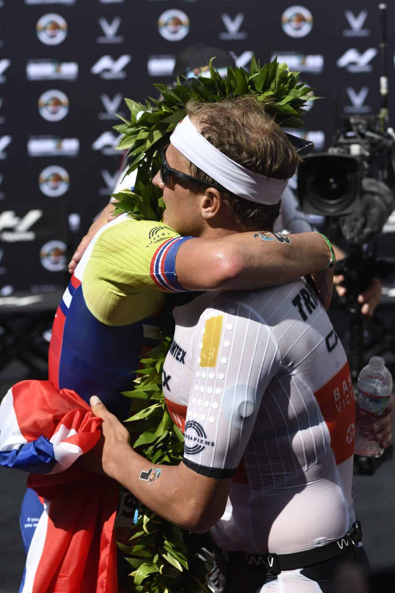 Kristian Blummenfelt and Gustav Iden embrace after a race