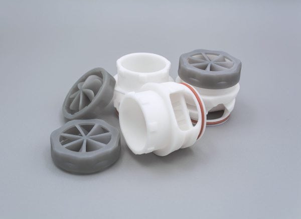 Multiple gray and white user pieces laying down