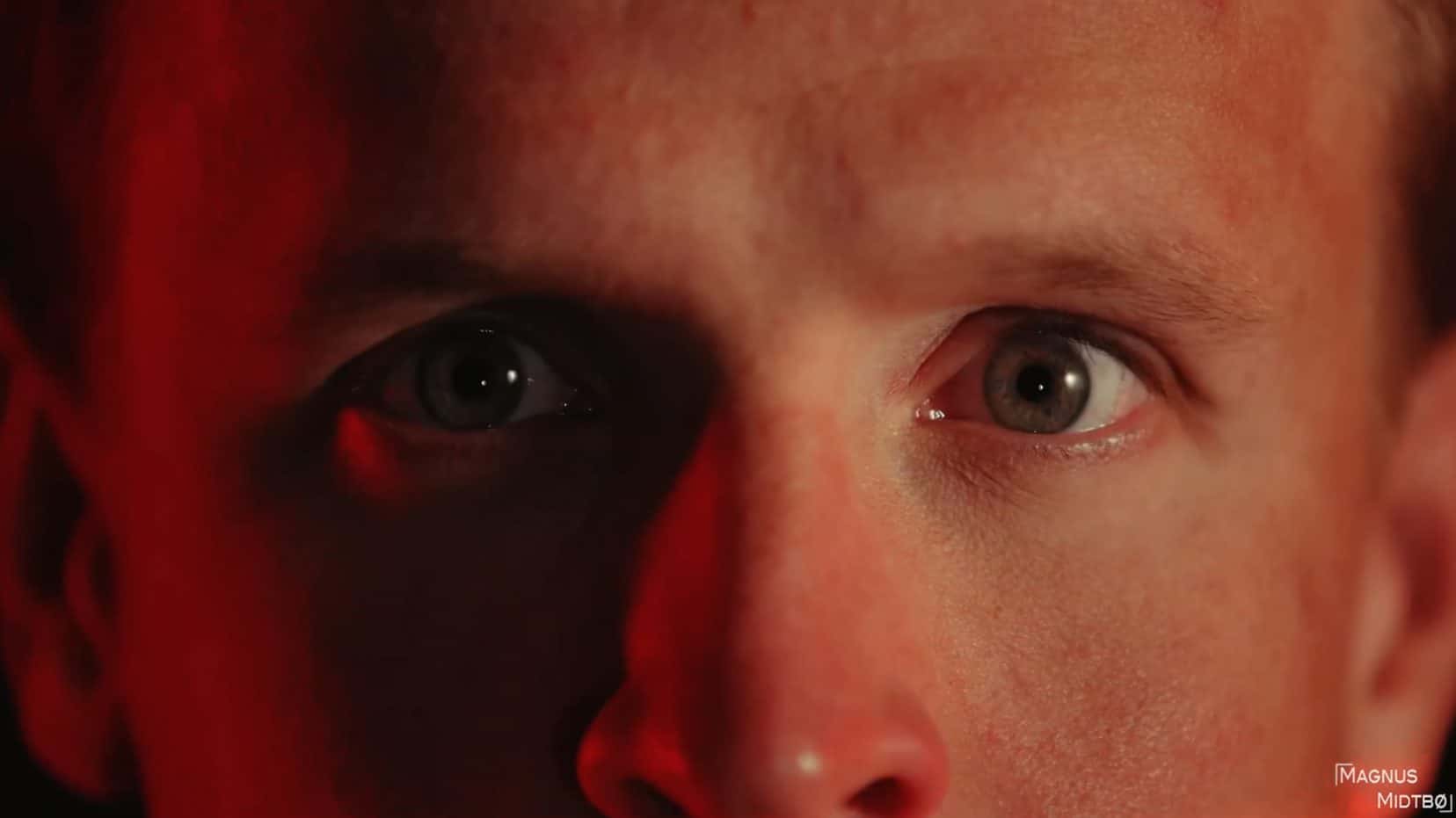 a close up photo of kristian blummenfelts eyes from the magnus midtbo documentary about training with the fittest man on earth